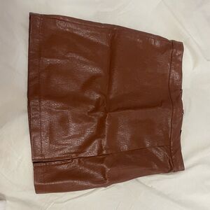 Foux leather mini skirt with small slit